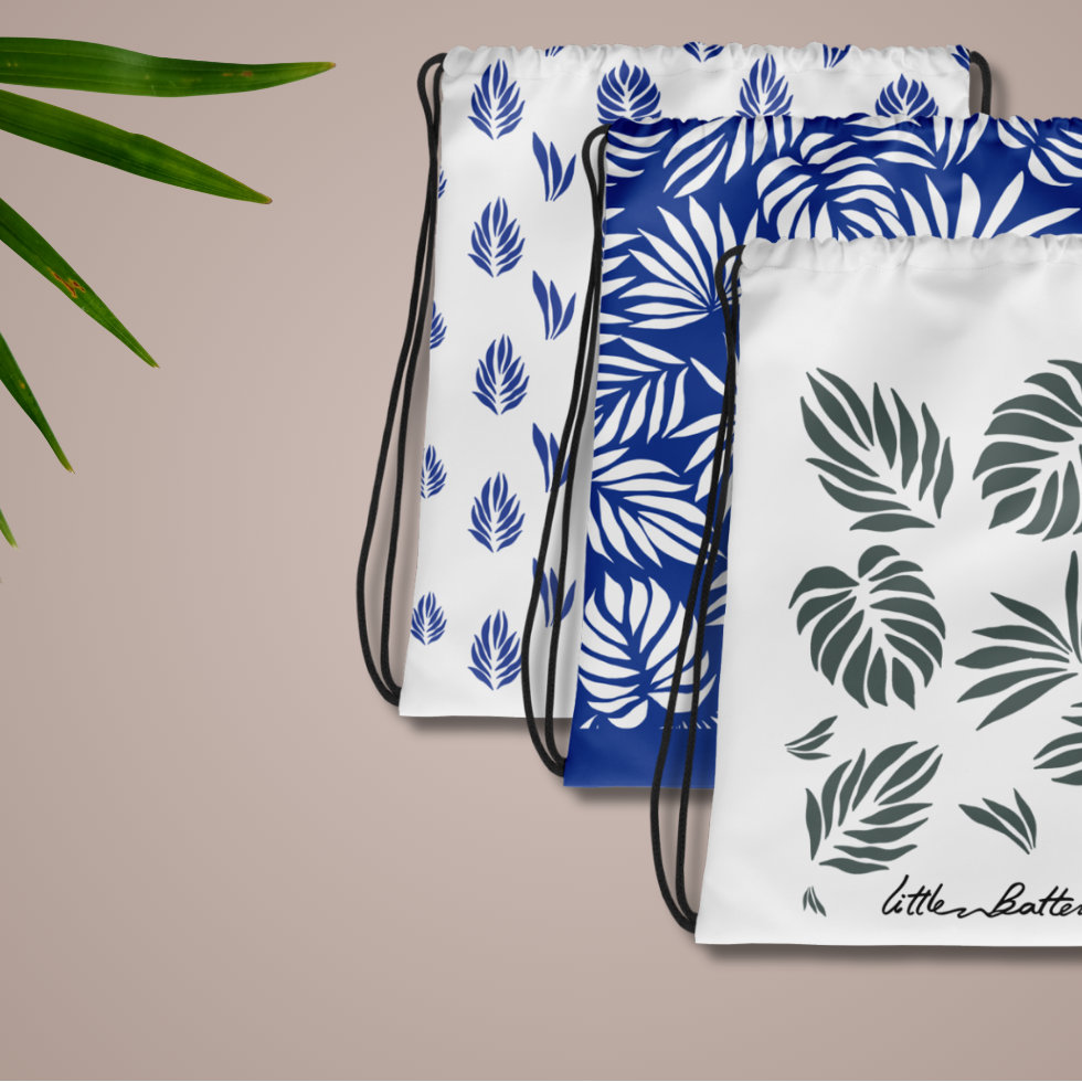 Assortment of Little Battersea organic drawstring bags, featuring sustainable design for baby and nursery storage