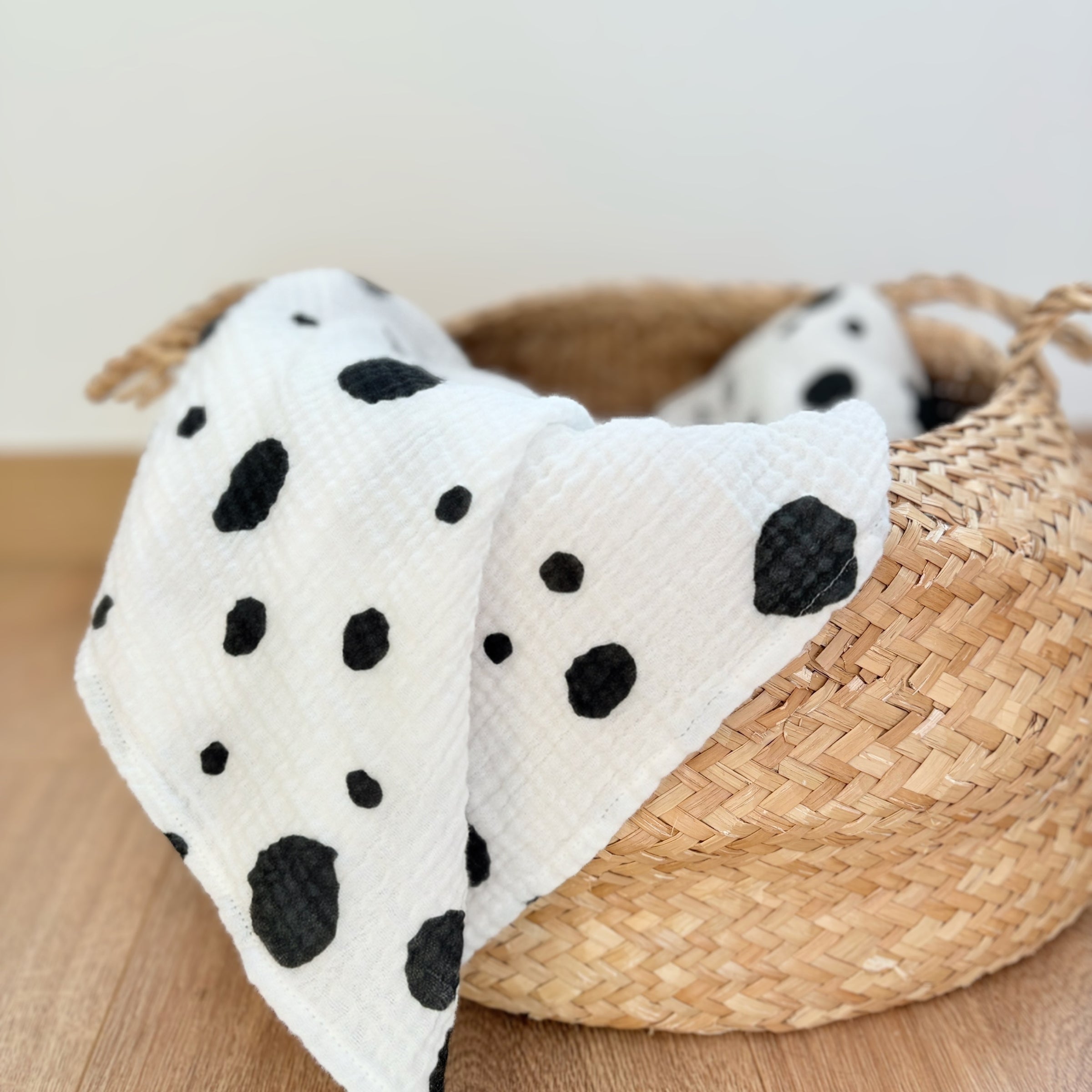 Allure en Noir design the Large square draped over a woven basket on a wooden surface.