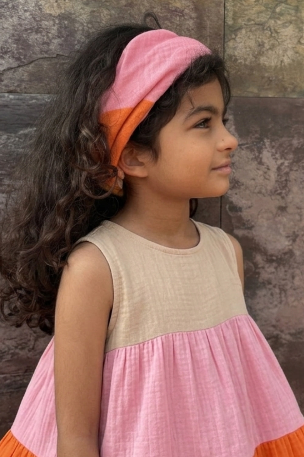 muslin cloth worn as hair accessory in daily use
