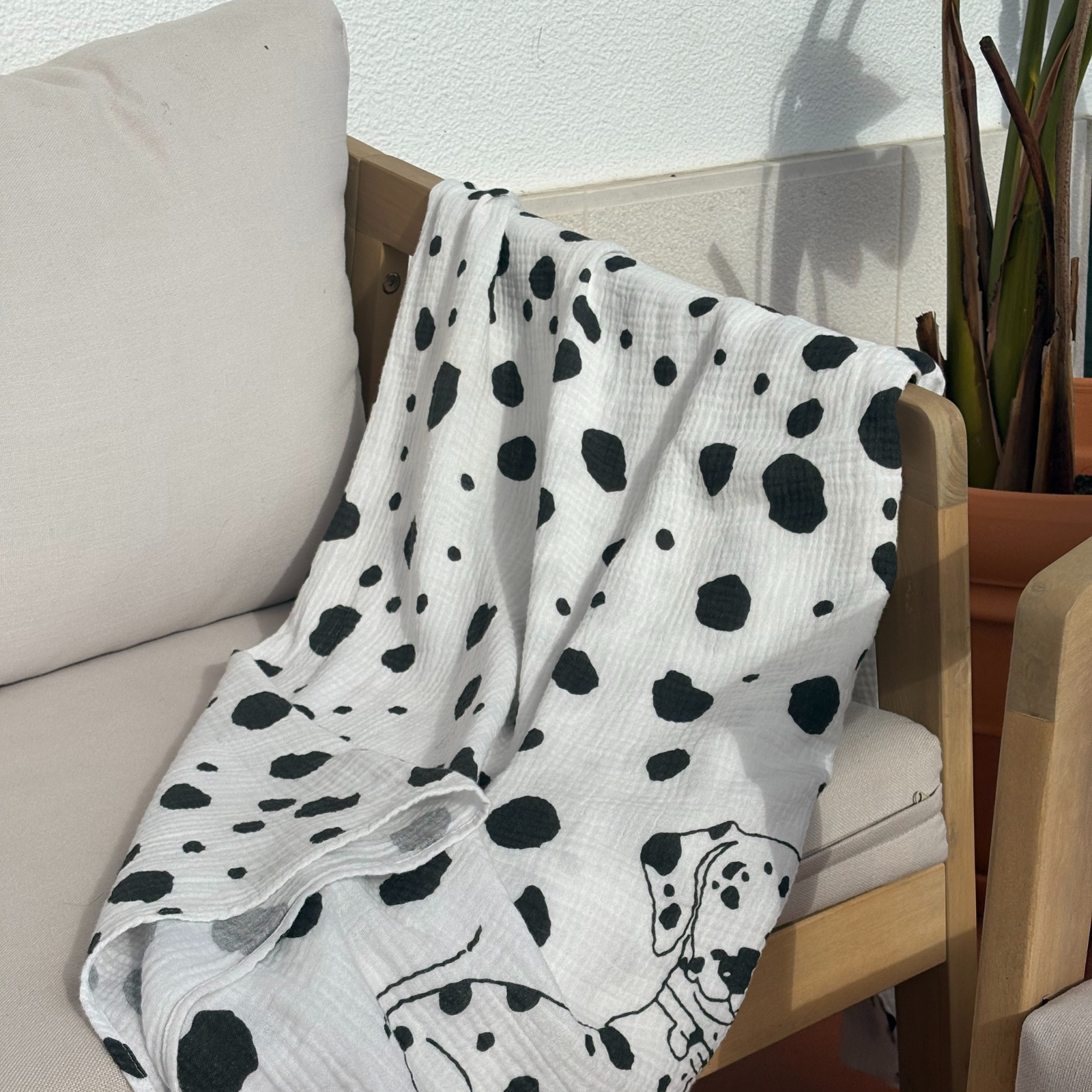 Large organic muslin baby blanket in Allure en Noir pattern, showcasing Little Battersea's sustainable luxury collection handcrafted in Portugal