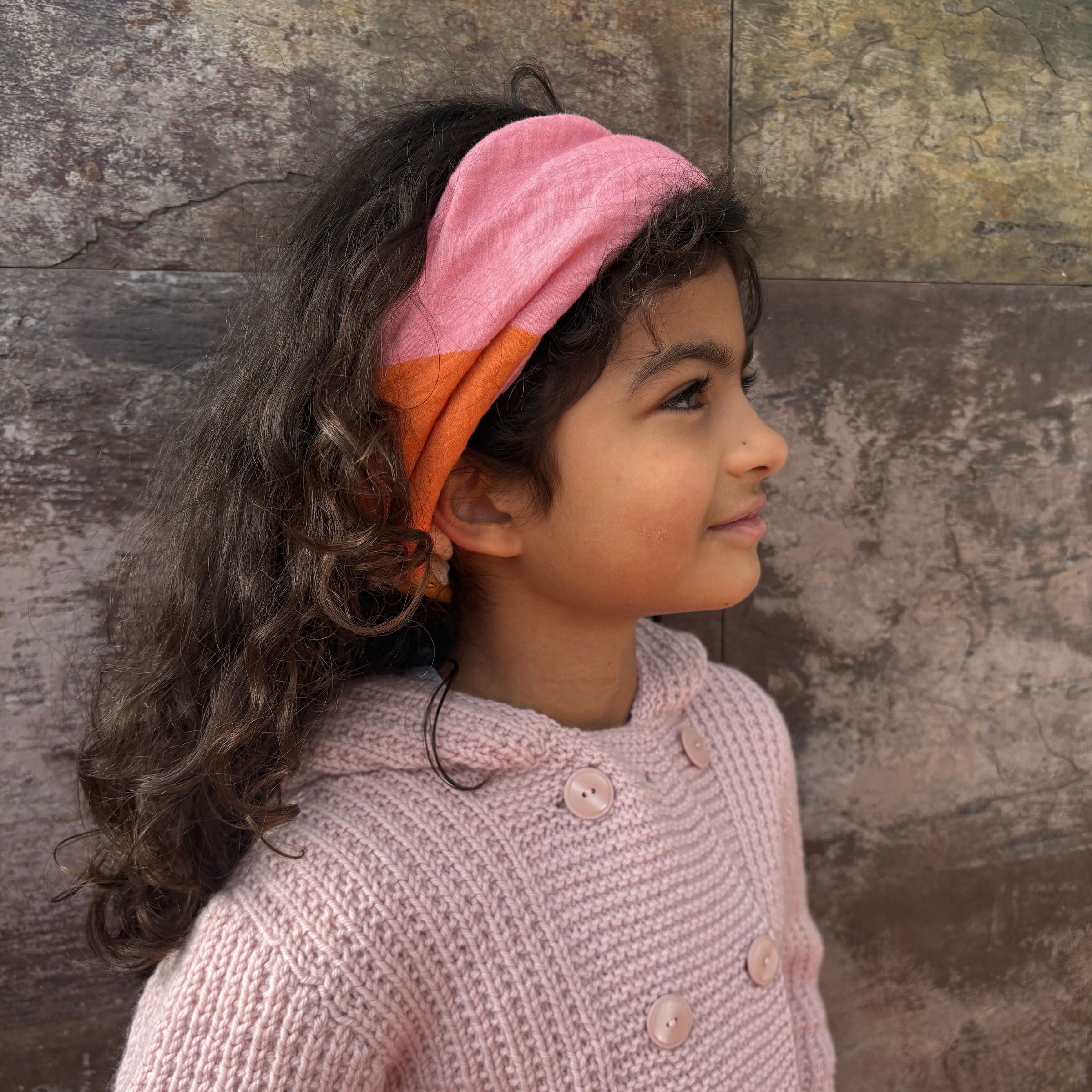 Pretty girl wearing the Golden indra bandana as headband.
