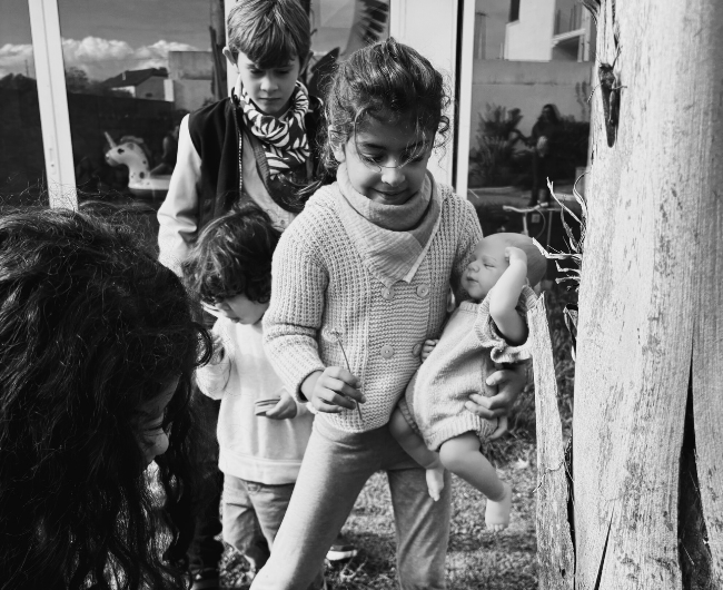 Joyful children at play, representing the future Little Battersea promises to protect.