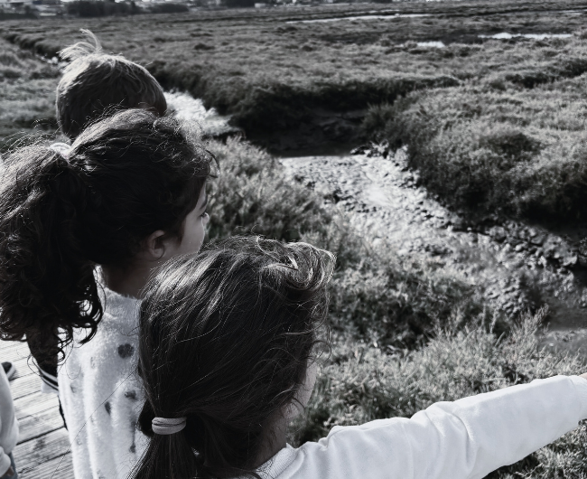An evocative image representing a diverse community and the shared future Little Battersea supports. Our kids playing in the Sanctuary Sado. 
